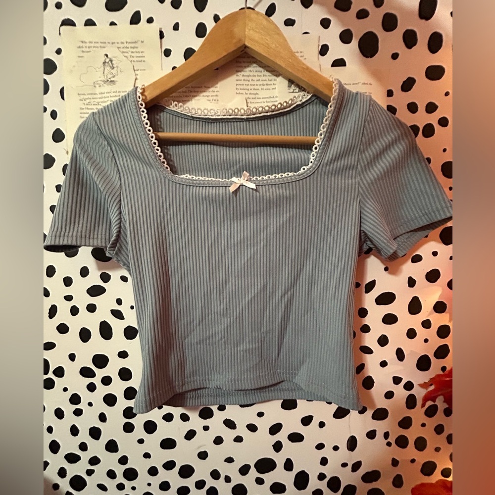 Light baby blue top with lace trim